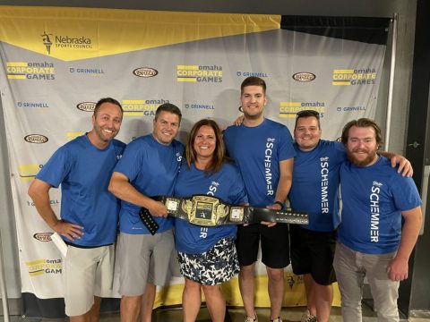 Omaha Corporate Games Top Golf Team with second place trophy