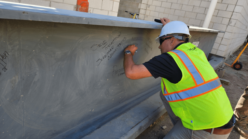 Beam Signing Ceremony Held for Mitchell High School Project